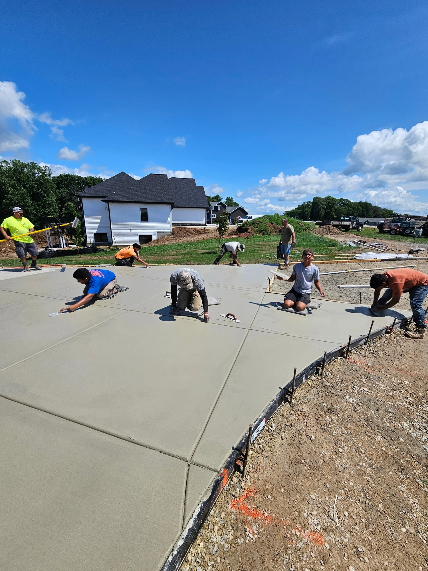 Crew Finishing a New Slab